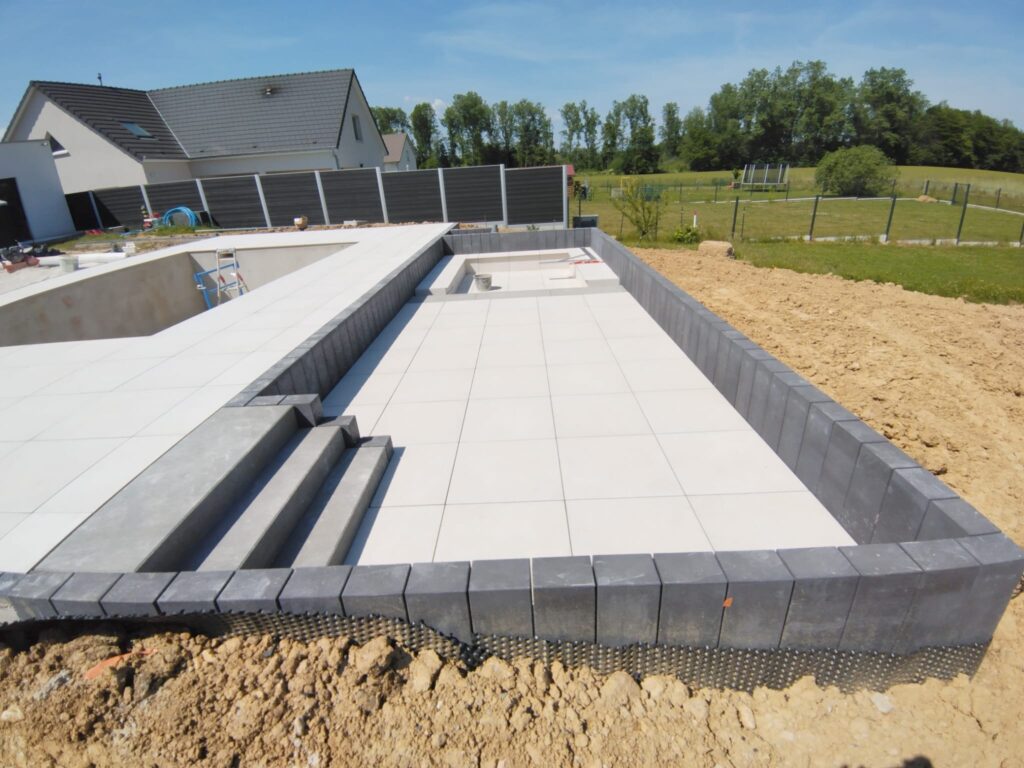 ma-maconnerie-90 - construction d'une piscine en béton